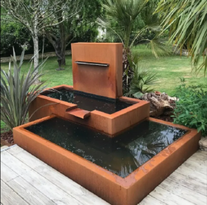 The item in the image is a Corten steel water feature created to enhance garden aesthetics.