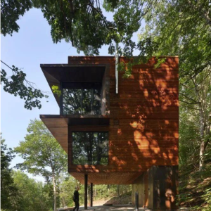 Corten Steel-Clad Home in the Forest